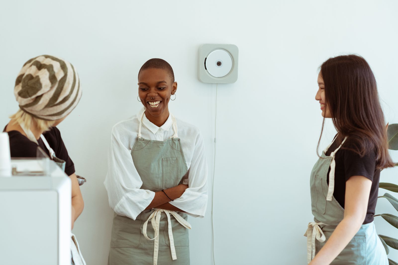 Smiling coworkers talking together