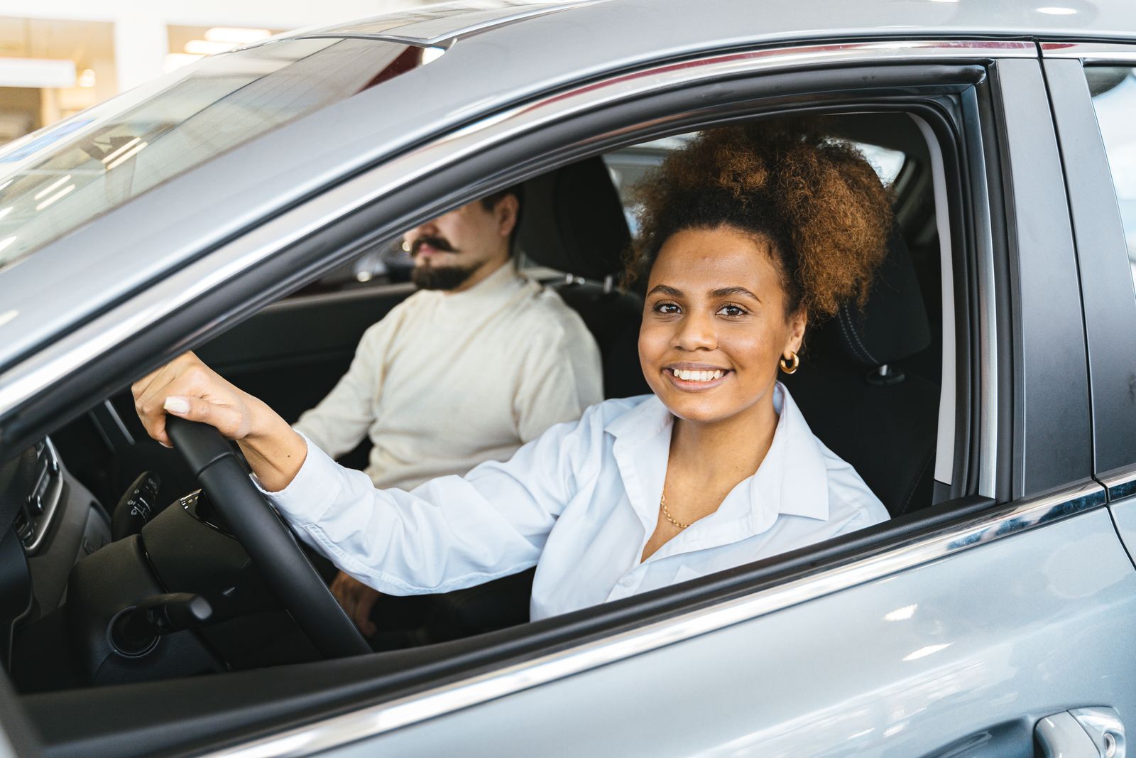 Happy driver behind the wheel